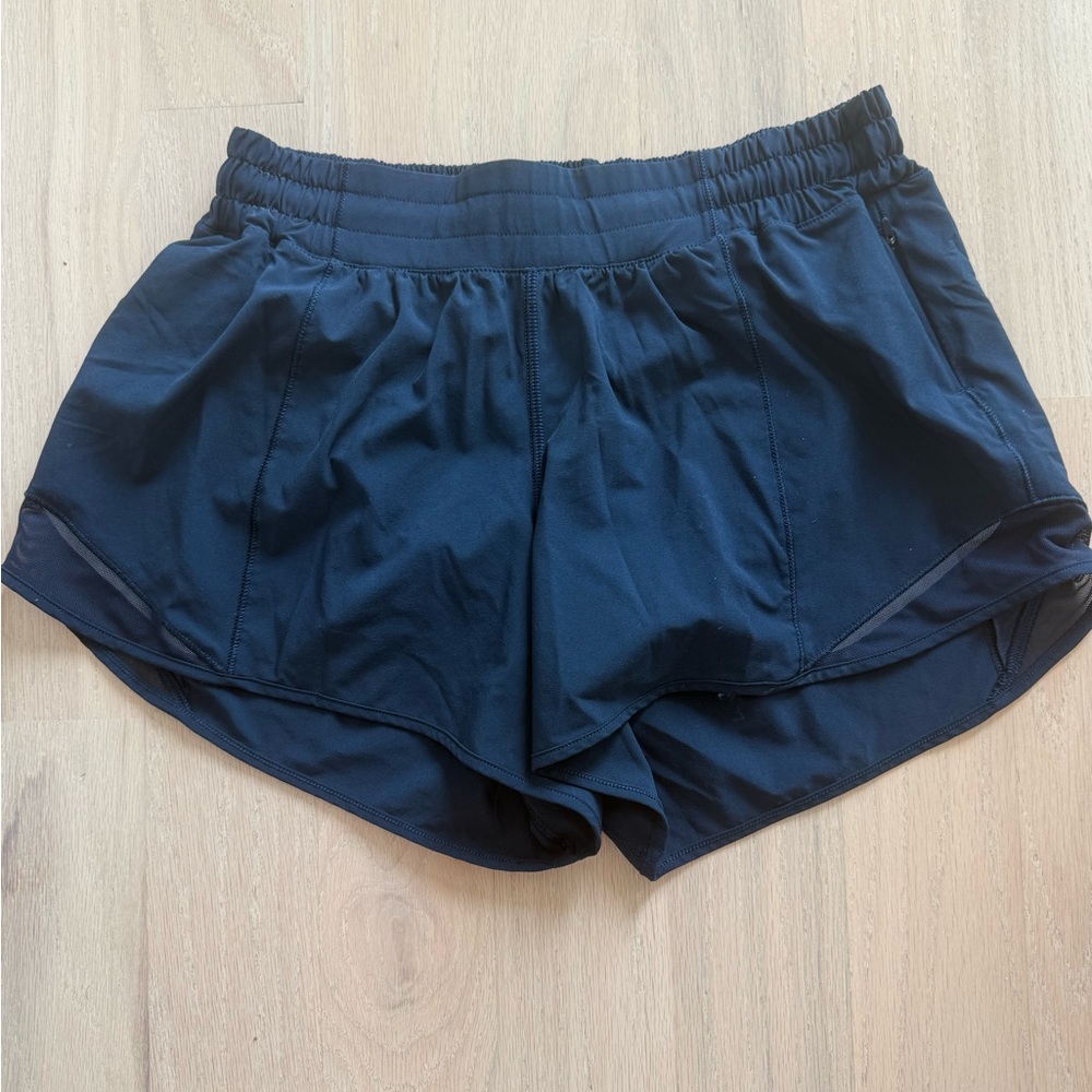Hotty Hot lululemon lined short. Navy. Only worn twice. 8 Tall.